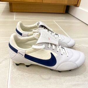 Nike soccer cleats, size 8, white and blue